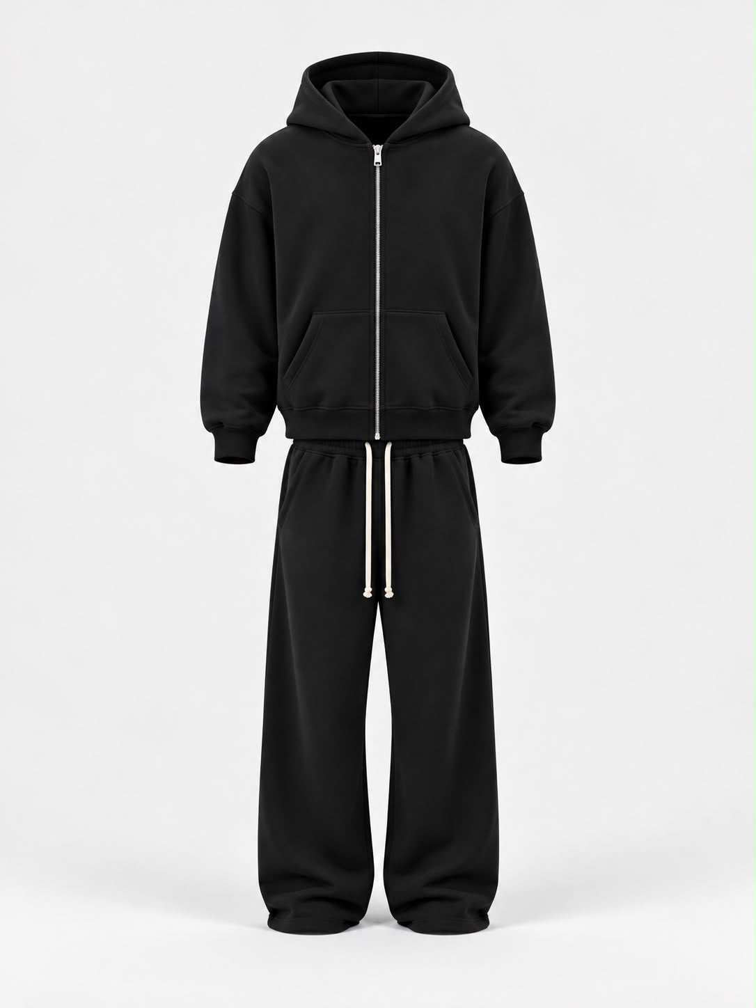 Tuta Felpata con zip nera, composta da felpa con cappuccio e pantaloni coordinati, con coulisse e polsini a coste.